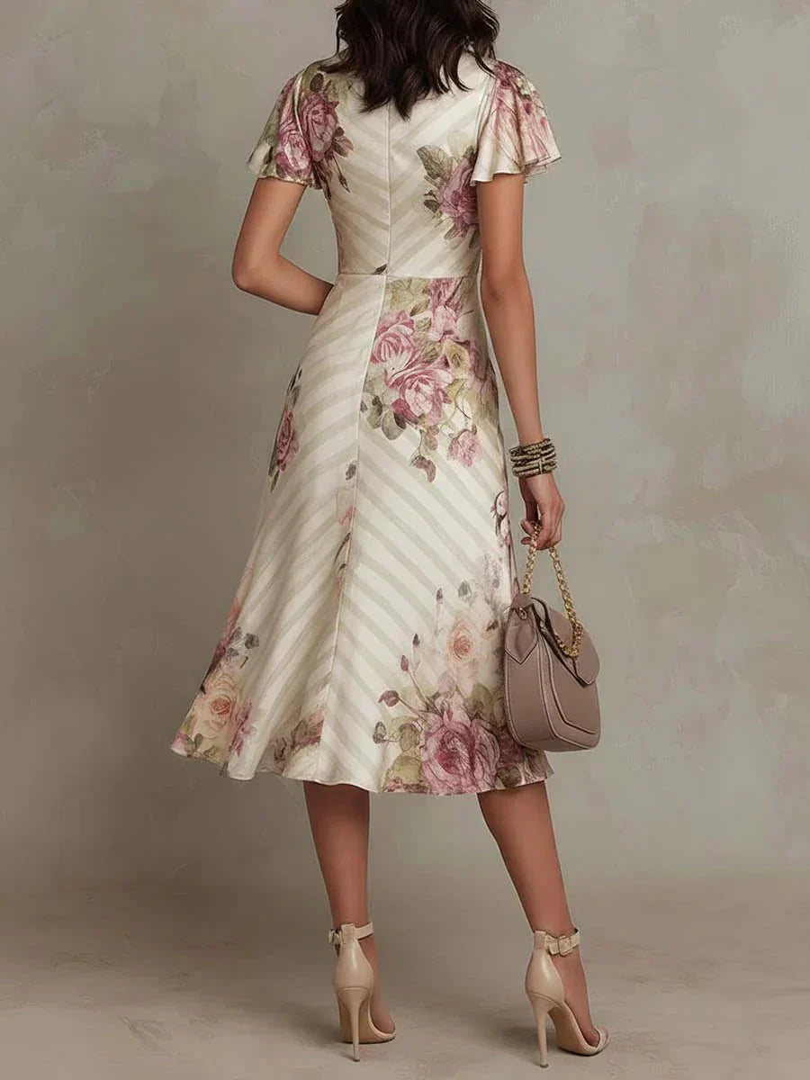 Alba | Elegante abito midi avvolgente con stampa floreale e ruches