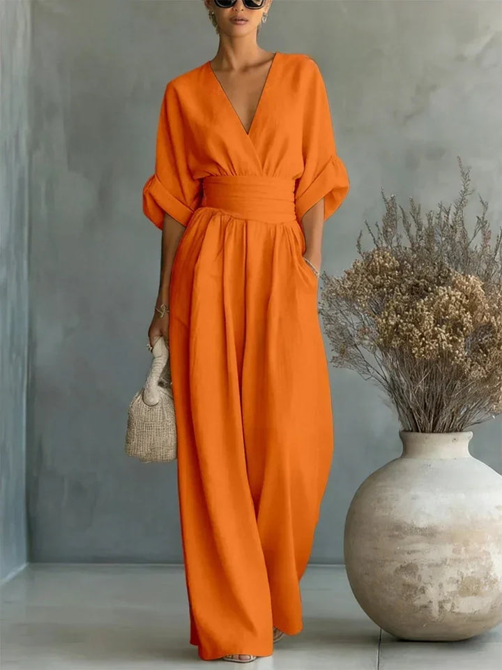Tuta elegante con scollo a V e vita alta • S1