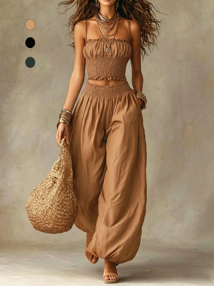 Completo due pezzi con top corto smockato e pantaloni a gamba larga