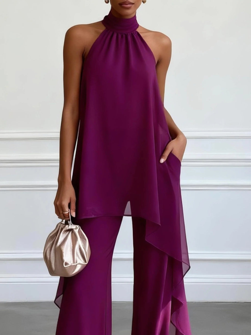 Completo due pezzi viola: top elegante senza maniche con scollo a halter e pantaloni
