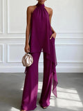 Completo due pezzi viola: top elegante senza maniche con scollo a halter e pantaloni