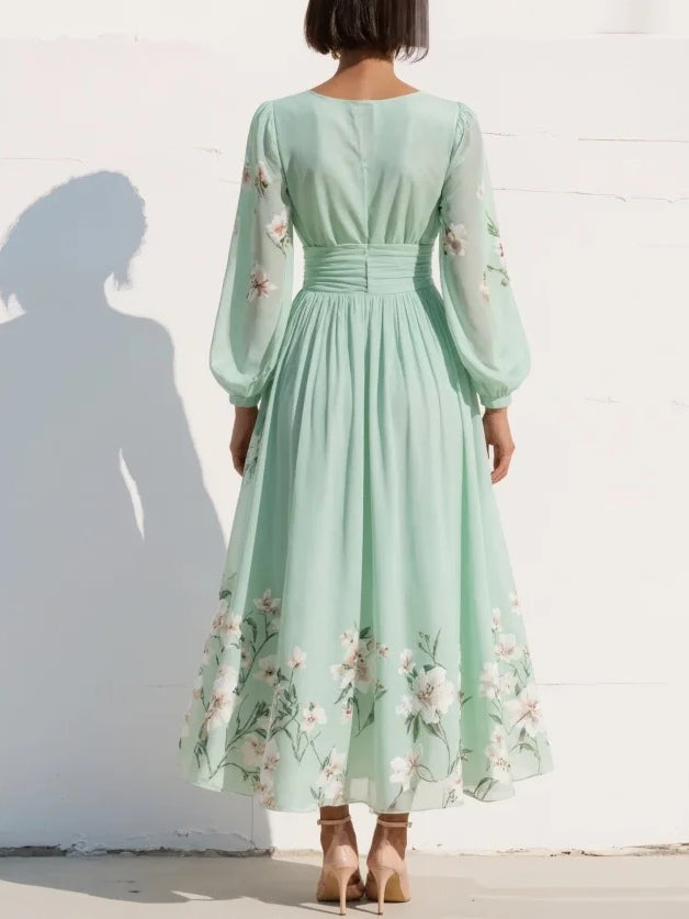 Vestito maxi in chiffon plissettato verde menta con stampa floreale per donna