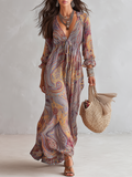 Abito lungo in chiffon con stampa paisley, scollo a V, arricciato
