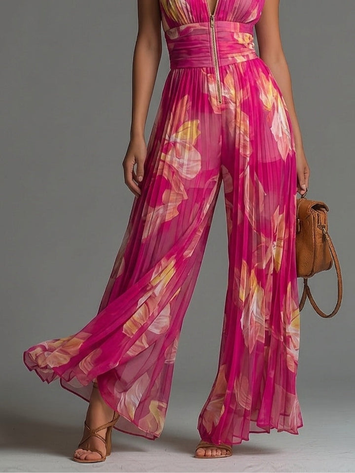 Tuta fucsia a fiori in chiffon, senza maniche, con zip e gamba larga
